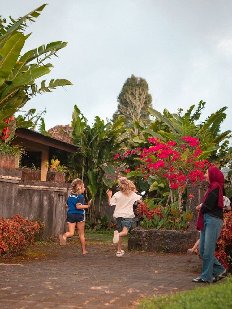 Children running and playing in the garden