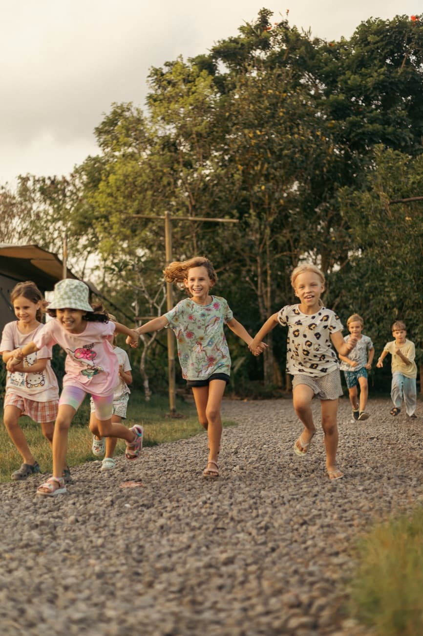 Happy children running together at Jungle Kids Bali